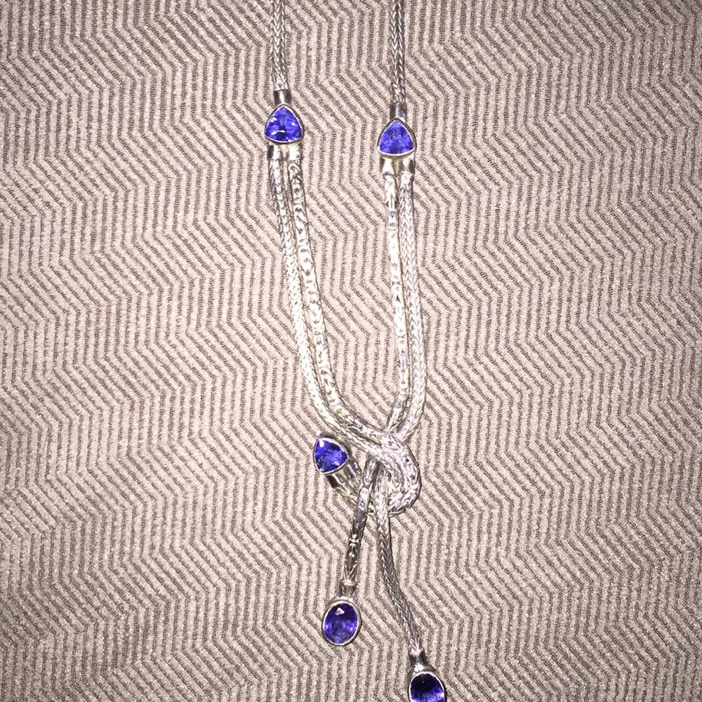 Silver knitted necklace with gemstones